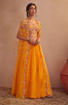 Aneesh Agarwaal-Mango Yellow Cape Skirt Set-INDIASPOPUP.COM Orange Indian Outfit, Aneesh Agarwaal, Haldi Dress For Bride, Haldi Outfit For Bride, Mehendi Dress, Cape Skirt, Cape Lehenga