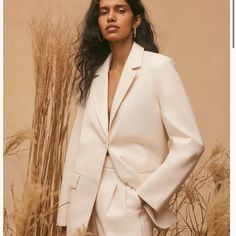 Size Xxs. Fits Oversized Modern White Outerwear With Notch Lapel, Modern White Blazer For Spring, Modern White Outerwear For Spring, Modern White Spring Outerwear, White Notch Lapel Blazer For Spring, Chic Winter White Blazer, Chic White Notch Lapel Outerwear, Chic White Outerwear With Notch Lapel, Classic Winter White Blazer For Spring