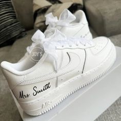 Exactly as shown in the pictures. Made in USA. Authentic Air Force 1 Sneakers. Rhinestones and Faux White Pearls are applied. Satin or Tulle Included. The lettering on the outer sides of each shoe is hand-painted in a matte black color. Personalization Want to add your wedding date and name? Please leave a note in the cart or send us an email to order@joysclothing.com or leave a note in the cart stating the following: Order # Name Wedding Date Font # (see listing guide) *For example: 1014 | Mrs. Smith | 02.14.24 | #4 For no personalization, leave blank. Wedding Sneakers, Custom Air Force 1, Tulle Lace, Custom Sneakers, Walking Down The Aisle, Air Force 1, Custom Shoes, Sneakers White, Shirt Accessories