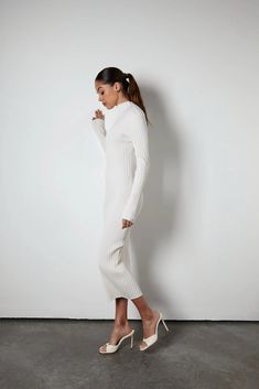 Feel sophisticated and elegant in this timeless knit dress. Crafted from a luxurious knit with a ribbed texture. Desk to drinks and into the weekend. -Medium Stretch - Ribbed Construction - Long Sleeves - High Neck Line - Midi Length Size — Model is 5ft9 / 175cm and wears size XS Thanksgiving Dress Outfit, Cream Knit Dress, Cream Knitted Dress, Thanksgiving Dress, How To Measure Yourself, Ribbed Texture, Dress Outfit, Style Gift, Xl Dress