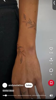 a person with a small tattoo on their arm