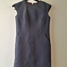 Great Wool Dress In Good Condition. Heavy With Side Pockets Elegant Shift Dress With Pockets, Fitted Mini Dress With Pockets For Daywear, Classic Sleeveless Dress With Pockets, Sleeveless Shift Midi Dress For Work, Formal Sleeveless Dress With French Seams, Shift Dress With Pockets For Work, Classic Fitted Dress With Pockets, A-line Sleeveless Dress With Pockets For Work, Elegant Fitted Sleeveless Dress With Pockets