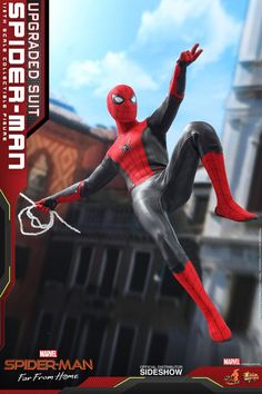 the action figure spider - man is flying through the air with his hands in the air