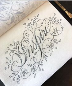 an inked piece of paper with the word smile written in cursive writing