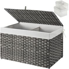 an outdoor wicker storage box with lid and liner is shown in front of a white background