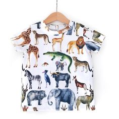 Safari t-shirt. Perfect for boys or girls. Made with super soft premium cotton Lycra it’s got a lovely stretch recovery and feels amazing, perfectly comfortable all day long.Completely handmade in Australia, please allow up to 2 weeks to create your items.