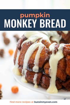 pumpkin monkey bread on a plate with white icing