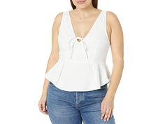 Free People Mika Tank Solid - Women's Clothing : Optic White : Boasting a unique and timeless silhouette, the Free People Mika Tank Solid will become your wardrobe staple. Classic fit top with a peplum silhouette. V-neckline with tie detail at the front. Sleeveless design. Smocking accent on the back. Rounded bottom hem. Pull-on construction. 100% cotton. Machine wash, line dry. Imported. Measurements: Length: 18 in Chest Measurement: 19 in Product measurements were taken using size XL (Women's Feminine Sleeveless Peplum Top For Day Out, Elegant Summer Peplum Top For Day Out, Elegant Sleeveless Peplum Top For Summer, Fitted Peplum Tank Top For Spring, Feminine V-neck Tie Back Tops, Chic Sleeveless Cotton Peplum Top, Free People Tank, Free People Tanks, Summer Peplum Tank Top