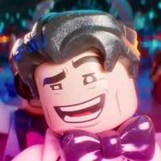 the lego movie character is wearing a purple bow tie