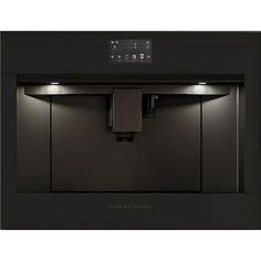 a black wall mounted oven with lights on it