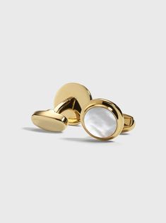 Prepare for compliments these gold tone and mother of pearl cufflinks are guaranteed to make you shine at your event. Polished brass Mother of pearl center Pearl Cufflinks Men, Gold Cufflinks Men, Groom Jewelry, Cufflinks Gold, Wedding Tux, Der Gentleman, Pearl Cufflinks, Button Studs, For Keeps