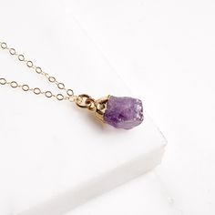 "February Birthstone - Natural raw amethyst chunk - February birthstone necklace - amethyst necklace - raw amethyst pendant - Mother's Day From our collection of natural raw birthstone necklaces. The Amethyst is February's birthstone. Because of the natural raw origin of our stones, all these necklaces are unique and the shape and size of the stone will vary slightly from the one in the photos. Necklaces comes in a gift box and also includes the Amethyst info card with properties of the stone th Birthstone Necklaces, Raw Gold, Chrysoprase Necklace, February Birthstone Necklace, Lapis Lazuli Jewelry, Necklace Amethyst, Raw Amethyst, February Birthstone, Amethyst Necklace