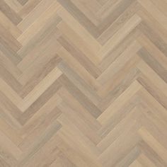 an image of wood flooring that looks like it is herringboneed in different colors