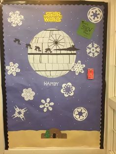 a door decorated with star wars characters and snowflakes