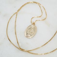 Our classic large Mother Mary pendant on a toddler strong chain - our classic 14/20 gold filled box chain, for the un-delicate wearers. Length: 20" Material: 14/20 Gold-Filled Charm Size: 12x24mm Mother Mary Necklace, Mary Necklace, Necklace Length Guide, Mother Of Pearl Necklace, Mother Pearl, Mother Mary, Pure Gold, Gold Filled Jewelry, Necklace Sizes