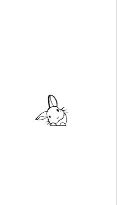 a drawing of a rabbit sitting on top of a table