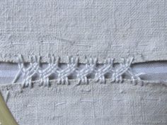 the stitches are stitched together to make an interesting piece of fabric that can be used in many projects