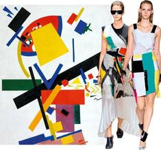 two models walking down the catwalk in front of a colorful abstract painting on a white wall