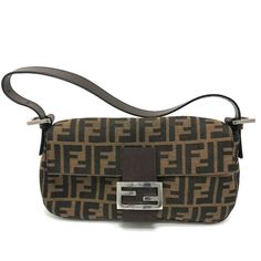 Item Information ITEM NO.: O-201103-4 NAME: FENDI FF logo Zucca pattern Mamma Baguette Flap shoulder bag Shoulder Bag SHAPE: Shoulder Bag MODEL NO.: 2321．26424 COLOR: Brown / BrownBased x SilverHardware MATERIAL: 2789 APPROX SIZE: W10.2 x H4.9 x D1.6inch / W26cm x H12.5cm x D4cm * Height is measured without flaps. The length of the shoulderer is adjustable. Gender: Women's Spec: [Open type]Magnet type [Inside] Zipper pocket x 1 ADDITIONAL ITEMS: None ITEM RANK: Used A Rank CONDITION DETAILS: Out Brown Rectangular Shoulder Bag With Logo Hardware, Everyday Flap Bag With Logo, Brown Shoulder Bag With Logo Hardware, Brown Shoulder Bag With Logo Hardware For Daily Use, Brown Logo Shoulder Bag For Daily Use, Brown Shoulder Bag With Logo For Everyday, Rectangular Shoulder Bag With Logo Strap For Shopping, Brown Shoulder Baguette Bag With Branded Hardware, Brown Baguette Shoulder Bag With Branded Hardware