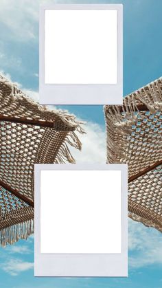 three white frames hanging from the side of a blue sky with wicker umbrellas