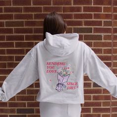 This hoodie is our most intricate and adorable design yet. With three embroidery locations, this is sure to be the most unique and high quality hoodie in your closet. The back will be a fully embroidered design, with your sorority letters & established year featured in the design. Your sorority will be embroidered on the left chest in a strawberry ice thread, and you will find adorable baby pink hearts flowing out of the pocket on the right side. All features are completely embroidered. Model is Embroidery Hoodie Designs, Big Embroidery Designs, Hoodie Embroidery Ideas, Sorority Hoodies, Embroidery Hoodies, Big Little Sorority Shirts, Big Little Sorority, Sorority Shirt Designs