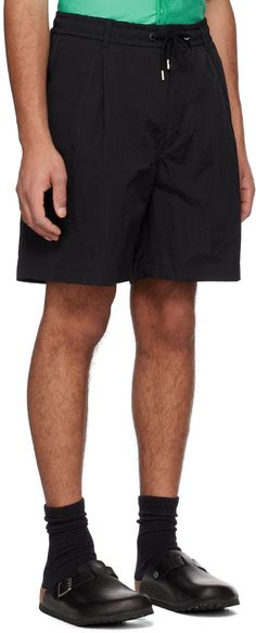 Crinkled nylon twill shorts. · Drawstring at elasticized waistband · Four-pocket styling · Zip-fly · Pleats at front · Logo hardware at back pocket · Silver-tone hardware Supplier color: Black Relaxed Fit Nylon Shorts For Spring, Spring Nylon Shorts With Relaxed Fit, Spring Nylon Shorts With Side Pockets, Nylon Shorts For Summer Streetwear, Summer Nylon Shorts For Streetwear, Spring Nylon Drawstring Shorts, Summer Streetwear Nylon Shorts, Nylon Drawstring Shorts For Streetwear, Black Sportswear Shorts With Functional Drawstring