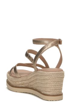 An espadrille-inspired wedge adds lift and earthy style to a standout sandal topped with smooth leather straps. 3" heel; 1 1/2" platform Leather upper/synthetic lining/rubber sole Imported Espadrille Wedge Sandals With Heel Strap, Summer Wedge Sandals With Platform Espadrille, Summer Platform Wedge Espadrille Sandals, Summer Espadrille Wedge Sandals With Platform, Straw Wedge Sandals With Ankle Strap And Cushioned Footbed, Straw Wedge Sandals With Cushioned Footbed And Ankle Strap, Straw Wedge Sandals With Removable Insole, Espadrille Wedge Sandals With Platform, Synthetic Platform Wedge Heel Espadrilles