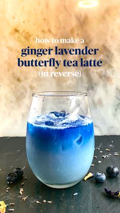 a blue drink in a glass with the words how to make a ginger lavender butterfly tea latte