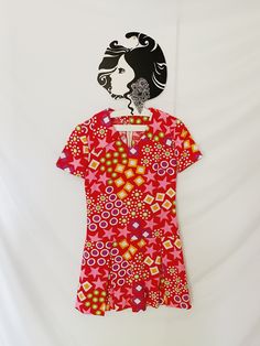 A fresh run of true vintage dresses are dropping this week. I will include brand, sizing, measurements, material, and any additional notes. Please refer to photos.  Brand: unknown Tagged size: unknown Material: cotton Pit to pit: 16" Shoulder: 14" Waist: 28.5" Hip: 31" Length: 31" Notes: short sleeve fit and flare style dress, likely handmade (no tags), beautiful vibrant confetti pattern, cotton material. Back metal zipper closure. *A little to snug for my mannequin so I don't have photos of her Retro A-line Dress With Vintage Print, Vintage Short Sleeve Mini Dress For Summer, Vintage Cotton V-neck Dress, Vintage V-neck Mini Dress For Summer, Pink Vintage Mini Dress With Short Sleeves, Summer Vintage Dress With V-neck, Retro Cotton Vintage Dress With Vintage Pattern, Summer Retro Cotton Vintage Dress, Retro A-line Dress With Vintage Pattern