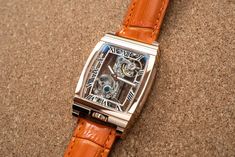 DESCRIPTION:  This is a fine classic mechanical watch. It does not require battery. All the parts on this watch is beautifully crafted. Cool thing about this watch is that you can actually see through front to back, to sides and you can enjoy all the gears move inside the watch.  COLOR: ROSE GOLD WITH ORANGE GENUINE LEATHER BAND (20mm LINK) WATCH CASE SIZE: 32MM X 51MM WATCH THICKNESS: 10MM DISPLAY: ANALOG CASE: STAINLESS STEEL MOVEMENT: MANUAL MECHANICAL WATER RESISTANCE RATING: 3ATM (30 METERS Rose Gold Watches With Skeleton Rectangular Dial, Rose Gold Rectangular Watch With Skeleton Dial, Rose Gold Watch With Skeleton Dial And Rectangular Shape, Rose Gold Watches With Skeleton Dial As Gift, Rose Gold Automatic Watch As Gift, Rose Gold Watch With Skeleton Dial As Gift, Rose Gold Automatic Watch As A Gift, Rose Gold Automatic Watch Gift, Rose Gold Automatic Watch For Gift