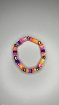 This bracelet is a Sunset Paradise inspired bracelet with beautiful mixes of pink, purple, orange and yellow! It is 2 1/8x2 1/8 inches and a very stretchy bracelet! I hope you purchase it! Trendy Adjustable Multicolor Stretch Bracelet, Trendy Multicolor Adjustable Stretch Bracelet, Vibrant Rainbow Bracelets With Colorful Beads, Adjustable Multicolor Stretch Bracelet For Friendship, Fun Multicolor Stretch Bracelet For Friendship, Adjustable Multicolor Stretch Bangle Bracelet, Trendy Multicolor Stretch Bracelet For Gift, Trendy Multicolor Stretch Bangle Bracelet, Trendy Multicolor Stretch Bracelet As Gift