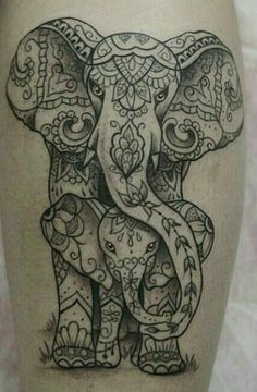 an elephant tattoo on the leg