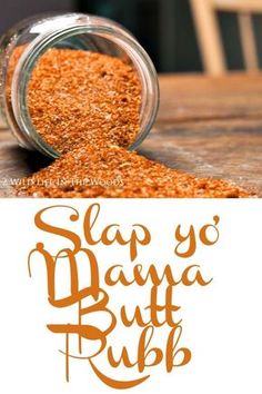 a jar filled with spices sitting on top of a wooden table next to a sign