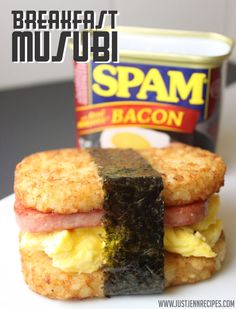 two breakfast muffins with bacon and scrambled eggs on them next to a can of spam bacon