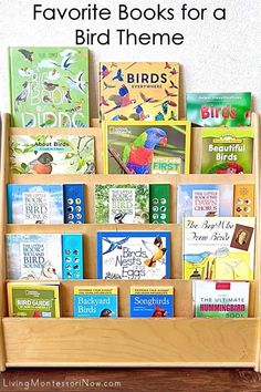 a wooden book rack filled with books and the words favorite books for a bird theme