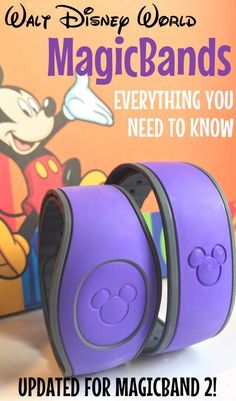 two purple mickey mouse wristbands with the words, walt world magic bands everything you need to know