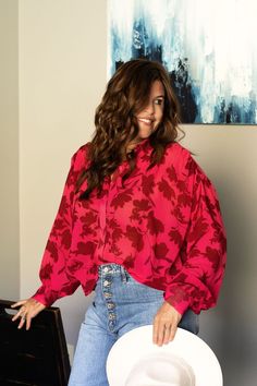 This gorgeous blouse in shades of reds looks fab with blue, white or black jeans. Chic Flowy Button-up Blouse, Pink Blouse With Blouson Sleeves For Fall, Flowy Pink Blouse For Fall, Pink Blouse For Fall Daywear, Pink Blouse For Daywear In Fall, Feminine Long Sleeve Blouse With Rose Print, Feminine Long Sleeve Rose Print Blouse, Pink Blouson Sleeve Blouse For Daywear, Pink Blouse With Blouson Sleeves For Daywear