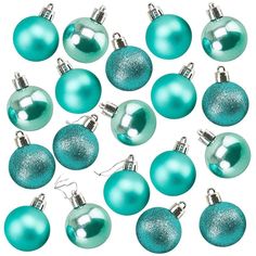 a bunch of blue christmas ornaments on a white background