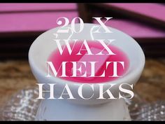 the words wax melt hacks are in front of a white bowl with pink liquid