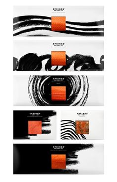 three different types of black and orange paint on white paper with an orange strip in the middle