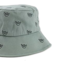 The Ultimate Blend of Sun Safety and Toddler-style Swagger This Toddler bucket hat is the ideal choice for keeping your little one protected from the sun while ensuring he or she looks adorable. The "Shaka Brah" print adds a playful, tropical touch. It’s the perfect accessory for beach outings, park adventures, or simply soaking up the sunshine. This bucket hat will stay securely in place while keeping your toddler cool and shaded. Designed in Hawaii Lined Embroidered Shaka Sign Toddler Size Casual Adjustable Bucket Hat With Uv Protection, Casual Bucket Hat With Uv Protection And Adjustable Fit, Trendy Adjustable Sun Hat, Casual Adjustable Fit Bucket Hat For Summer, Casual Adjustable Bucket Hat For Summer, Casual Adjustable Bucket Sun Hat, Trendy Adjustable Bucket Hat With Upf 50+, Adjustable Cotton Bucket Hat For Summer, Casual Adjustable Bucket Hat For Beach