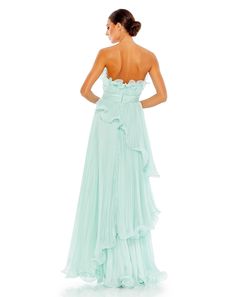 Designed in solid chiffon, this dress focuses on luxe texture—pleats and structured ruffles—for a look that’s easy on the eyes. Wow everyone in the room as you enter in the strapless confection styled with a faux waist sash and Grecian-inspired asymmetrical, tiered skirt. Mac Duggal Pleated Chiffon Fabric (100% polyester) Fully lined Strapless neckline Sleeveless Ruched waistline Ruffled tiered asymmetrical skirt Concealed back zipper Approx. 62.5" from top of shoulder to bottom hem Available in Strapless Evening Dress With Pleated Bodice For Spring, Elegant Prom Maxi Dress With Ruffled Straps, Chic Prom Dress With Ruffled Straps, Elegant Maxi Dress With Ruffled Straps For Prom, Evening Dresses With Ruched Bodice And Ruffled Straps, Strapless Pleated Maxi Dress For Gala, Chiffon Prom Dress With Ruffled Skirt, Elegant Sleeveless Ruffle Dress For Prom, Chiffon Dresses With Ruffled Skirt For Prom