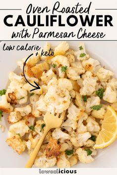 cauliflower with parmesan cheese on a white plate and a wooden spoon