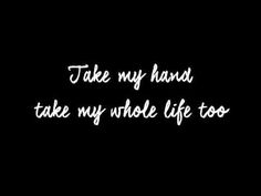 the words take my hand, take my whole life too written in white ink on a black background