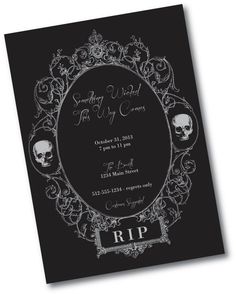 a black and white wedding card with skulls in the frame, on top of it