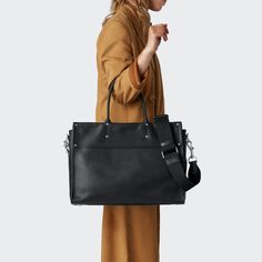 Laptop sleeve (padded for up to 15" laptop)Adjustable removable webbing shoulder strap two interior slip pockets for phone and accessoriesNickel plated brass hardwarezip closure main compartment | Shinola Women's Large Satchel Bag in Black Natural Leather