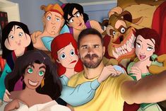 a man taking a selfie in front of cartoon characters