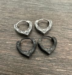 Unique textured hoop earrings are made of Stainless steel and have oxidation, to add more depth and details. Hoops are perfect for both men and women. Easy snap closure. Size of the hoops Face: 4mm Inner diameter: 9.5mm Outer diameter: 15mm Gauge: 20G (regular piercing) Listin for 1 pair (2 earrings) All items are shipped in a gift box Black Gothic Hoop Earrings Nickel Free, Black Small Hoop Punk Jewelry, Nickel Free Black Hoop Piercings, Nickel-free Black Hoop Piercings, Black Metal Hoop Cartilage Earrings, Black Stainless Steel Hoop Earrings, Black Sterling Silver Hoop Earrings, Black Minimalist Metal Cartilage Earrings, Black Gothic Hoop Earrings With Internal Threads