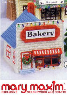 an advertisement for a toy store with christmas decorations on the front and side of it