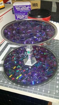 two trays that have been made out of cds